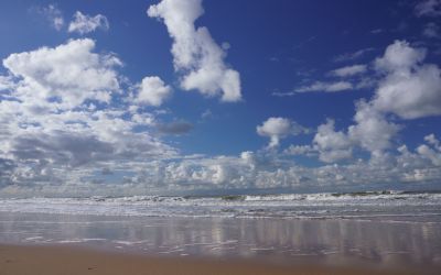 Beach and sea in Ostend under a cloudy sky